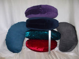 Grey & Blue thick pinwale chord = [L& R], Red & Teal crushed velvet [2 at bottom of stack], Purple & blue thick velvet on top of stack